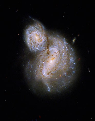 تصویر هابل از کهکشان‌های مارپیچی IC 4271